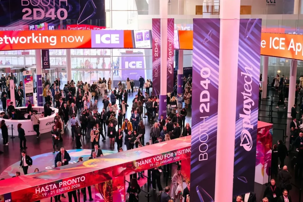 Visitors walking through a busy exhibition hall at ICE Barcelona 2027, filmed by our videographer